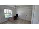 Bedroom featuring natural light, a ceiling fan and a desk at 11818 Sophia Ln, Orlando, FL 32821