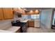 Spacious kitchen features modern appliances, countertops and easy access to the dining area at 11818 Sophia Ln, Orlando, FL 32821