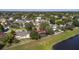 Expansive aerial view of a residential area showcasing well-maintained homes and lush green landscaping at 1254 Shelter Rock Rd, Orlando, FL 32835