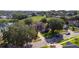 Aerial view of home with solar panels, landscaping, and circular driveway at 1254 Shelter Rock Rd, Orlando, FL 32835