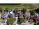 Aerial view shows layout of pool, house and yard with solar panels at 1254 Shelter Rock Rd, Orlando, FL 32835