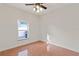 Bedroom featuring neutral walls, tile floors, and a window at 1254 Shelter Rock Rd, Orlando, FL 32835