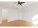 Bedroom featuring wood floors, a ceiling fan, closet, and lots of natural light at 1254 Shelter Rock Rd, Orlando, FL 32835