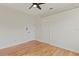 Bedroom featuring neutral walls, ceiling fan, and classic wood floors at 1254 Shelter Rock Rd, Orlando, FL 32835