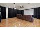 Bonus room with hardwood floors, a ceiling fan, projector, recessed lighting, and a movie screen at 1254 Shelter Rock Rd, Orlando, FL 32835