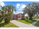 Stately two-story home featuring a brick-paved driveway and well-manicured lawn at 1254 Shelter Rock Rd, Orlando, FL 32835