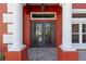 Elegant wrought iron double front door with stone pillars at 1254 Shelter Rock Rd, Orlando, FL 32835
