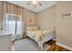 Charming bedroom with natural light and stylish decor at 12618 Lakebrook Dr, Orlando, FL 32828