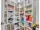 Organized pantry featuring ample shelving and storage space for kitchen essentials at 12618 Lakebrook Dr, Orlando, FL 32828