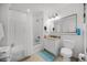 Cozy bathroom featuring a shower-tub combo, convenient toilet and sink, and bright vanity lighting at 13415 Blue Heron Beach Dr # 1503, Orlando, FL 32821