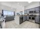 Modern kitchen with stainless appliances, ample cabinets, and seamless flow into the living space at 13415 Blue Heron Beach Dr # 1503, Orlando, FL 32821