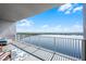 Breathtaking lake view from the condo's large, private balcony with white railings at 13427 Blue Heron Beach Dr # 2003, Orlando, FL 32821