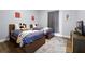 Comfortable bedroom with two twin beds, carpet and matching decor at 13427 Blue Heron Beach Dr # 2003, Orlando, FL 32821