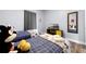 Comfortable bedroom with two twin beds, carpet and matching decor at 13427 Blue Heron Beach Dr # 2003, Orlando, FL 32821