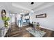 Bright open floor plan showcases modern decor, wood floors, and a breakfast bar with seating at 13427 Blue Heron Beach Dr # 2003, Orlando, FL 32821