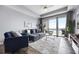 Comfortable living room with a view of the balcony and lake at 13427 Blue Heron Beach Dr # 2003, Orlando, FL 32821