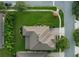 Two-story home with lush landscaping and a well-manicured lawn in a Gathering-friendly neighborhood at 14572 Black Quill Dr, Winter Garden, FL 34787