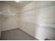 Walk-in closet with carpet flooring, white walls, and wire shelving at 14572 Black Quill Dr, Winter Garden, FL 34787