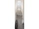 Bright foyer with chandelier lighting, tile flooring and decor at 14572 Black Quill Dr, Winter Garden, FL 34787