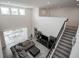 Open concept living room with high ceilings, dining area and staircase at 14572 Black Quill Dr, Winter Garden, FL 34787