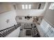 Spacious living room with high ceilings showcasing modern decor and bright, natural light at 14572 Black Quill Dr, Winter Garden, FL 34787
