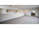 Spacious upstairs landing with neutral carpet at 14572 Black Quill Dr, Winter Garden, FL 34787