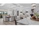 Elegant dining area adjacent to the kitchen, featuring stylish furnishings and modern decor at 1613 Bellagio Loop, Tavares, FL 32778