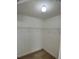 Walk-in closet with tile flooring and wire shelving at 1715 Redfin Way, Kissimmee, FL 34759