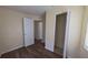 A bedroom featuring wood-look flooring at 2031 Warrens Ave, Maitland, FL 32751