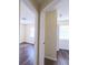 Hallway with multiple entrances to sunlit rooms at 2031 Warrens Ave, Maitland, FL 32751