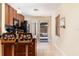 Well-lit kitchen featuring bar seating and a seamless transition to outdoor space at 2272 Raeford Rd # A-3, Orlando, FL 32806