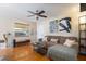 Inviting living room with hardwood floors, ceiling fan and comfortable seating at 2272 Raeford Rd # A-3, Orlando, FL 32806