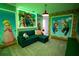 Unique themed bedroom with playful decor and comfortable seating for a fun and creative space at 2379 Distant Sun Trl, Kissimmee, FL 34747