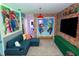 Themed bedroom with a cozy seating area, perfect for entertainment and relaxation at 2379 Distant Sun Trl, Kissimmee, FL 34747
