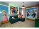 Fun themed bedroom perfect for with comfortable seating at 2379 Distant Sun Trl, Kissimmee, FL 34747