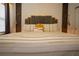 This bedroom showcases a plush bed with elegant accents, including sconce lighting and a padded headboard at 2379 Distant Sun Trl, Kissimmee, FL 34747