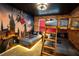 The bedroom features brick walls, Harry Potter themed decor, and custom wooden bunk beds with ambient lighting at 2379 Distant Sun Trl, Kissimmee, FL 34747