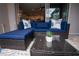 Relaxing patio featuring a stylish outdoor sofa, ideal for entertaining and enjoying the outdoor ambiance at 2379 Distant Sun Trl, Kissimmee, FL 34747