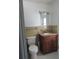 Cozy bathroom features a modern vanity and fixtures at 2632 Derbyshire Rd, Maitland, FL 32751