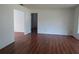 Open living room with hardwood floors perfect for entertaining at 2632 Derbyshire Rd, Maitland, FL 32751