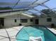 A refreshing enclosed pool offering a tranquil escape for relaxation and enjoyment at 2632 Derbyshire Rd, Maitland, FL 32751
