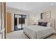 Comfortable bedroom with a sliding glass door to outdoor deck, offering easy access to outdoor space at 2652 Bent Hickory Cir, Longwood, FL 32779