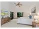 Bright bedroom with large windows, offering natural light and a serene view, perfect for relaxation at 2652 Bent Hickory Cir, Longwood, FL 32779