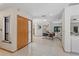 Spacious foyer with marble floors, a decorative front door, and an open floor plan at 2652 Bent Hickory Cir, Longwood, FL 32779