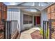 Inviting front entrance with a walkway, decorative brick elements, and a red front door at 2652 Bent Hickory Cir, Longwood, FL 32779