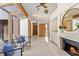 Inviting living room with a fireplace and glass doors, offering a cozy and bright space at 2652 Bent Hickory Cir, Longwood, FL 32779