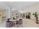 Open living room featuring high ceilings, large windows, sliding glass doors and an open floor plan at 2652 Bent Hickory Cir, Longwood, FL 32779