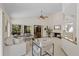 Inviting living room with a fireplace, ample natural light, and comfortable seating arrangements at 2652 Bent Hickory Cir, Longwood, FL 32779