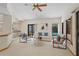 Bright living room with large windows overlooking the pool, creating a relaxed atmosphere at 2652 Bent Hickory Cir, Longwood, FL 32779