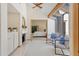 Stylish living room with a fireplace, offering a view into the bedroom, enhancing the home's open feel at 2652 Bent Hickory Cir, Longwood, FL 32779